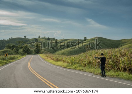 Young photographers are taking pictures of nature.