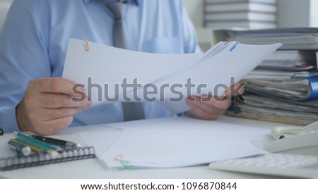 Businessman Working with Documents in Accounting Office