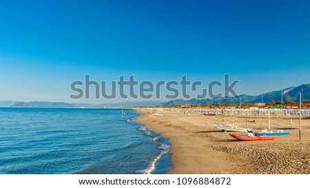 amazing versilia beach on sunrise Royalty-Free Stock Photo #1096884872