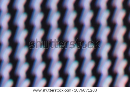 LED lights on the billboard. This is blurred photography, taken by slow shutter speeds and moving the camera in different directions while pressing the shutter button. This is not the illustration. 