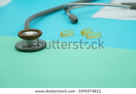 closeup Medical equipment Stethoscope and drug on colorful pastel paper for background .