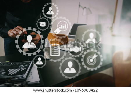 Human resources management with recruitment business working concept. HR manager is selecting candidate for hiring with virtual screen computer.