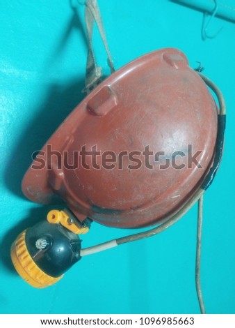 orange miner's helmet