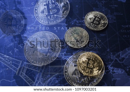 Bitcoins and Eiffel Tower decorated on world map (Crypto currency)