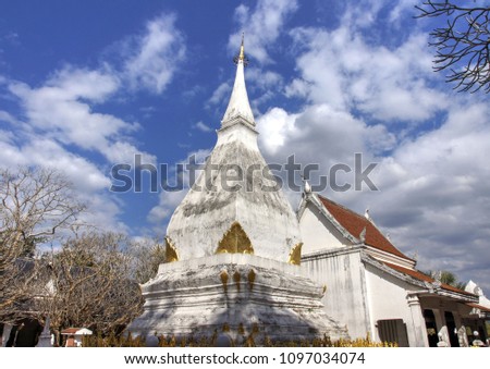 Prathat Si Song Rak, Dan Sai Loei Thailand. Background is bright and beautiful sky. This Lao-style white pagoda was built as a symbol of a mutual friendship between Ayuttaya and  Laos.