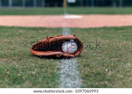 baseball glove and ball