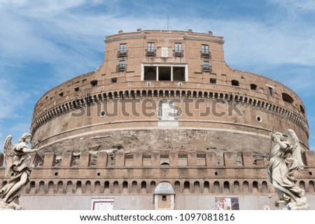 Horizontal picture of huge Castelo Sant'Angelo during blue sky day in Rome, Italy