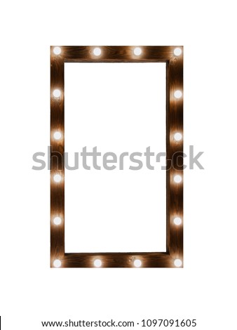 wooden brown frame of dressing mirror with light bulbs on a white background isolated. place for text