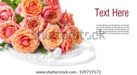Arrangement with roses and beads on a white background with text