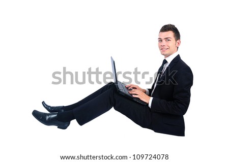 Isolated happy business man with notebook
