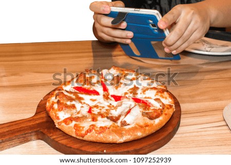 Take a photo by phone before eat pizza.Copy space on white background.