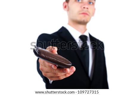 Isolated young business man giving wallet