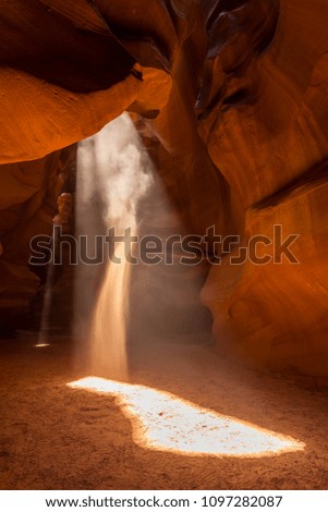 Upper Antelope Slot Canyon showing a light beam into the canyon, Page, Arizona, USA. The most popular location for photographers and sightseers.