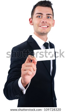 Isolated young business man presenting card