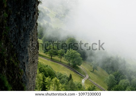 Mountains covered in mist in the Swiss alps