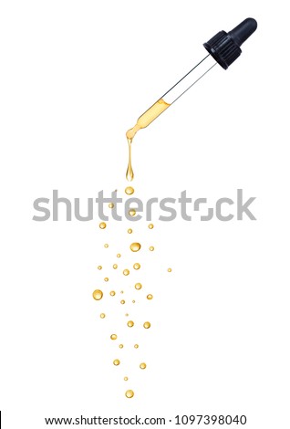 Close-up of dropper with falling drops isolated on white background  Royalty-Free Stock Photo #1097398040