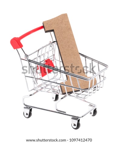 the lowercase wooden three-dimensional volumetric letter "l" in a mini shopping trolley cart on white background
