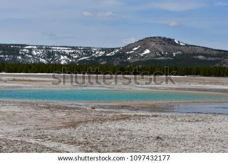 turquoise pool in the midway geyser basin in yellowstone national park