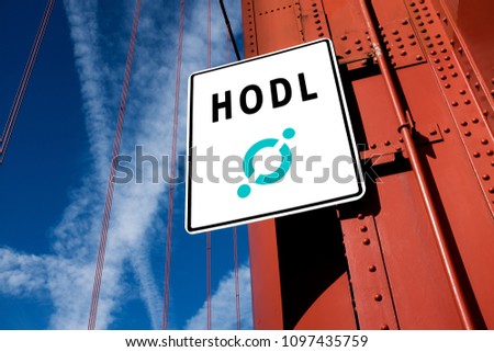 Cryptocurrency "HODL" concept, Icon ICX crypto logo on a traffic board sign, on golden gate bridge, with bright blue sky in background, bear market long time hold and not sell visualization 