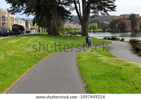 People walking on the path at Palace of Fine Arts 