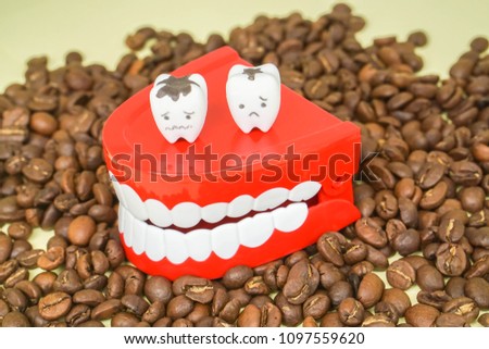 health concept - caffeine from drinking coffee lead to plague and decay to the human teeth