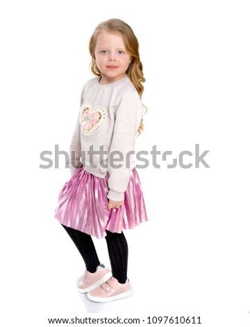 Beautiful little girl in full growth. The concept of a happy childhood, healthy lifestyle. Isolated on white background.