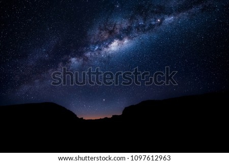 Milky way over the mountains at dusk