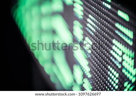 LED screen, macro. individual pixels of green color