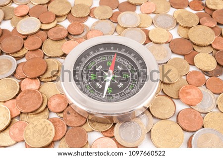 Picture of a Business Money Concept Idea Coins and Compass