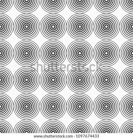 Abstract seamless pattern of circles. Flat design. Minimalistic graphic print. Vector monochrome background.