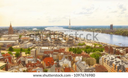 Aerial view of the TV tower, river Daugava,City market and residential district in the Latvian capital Riga 