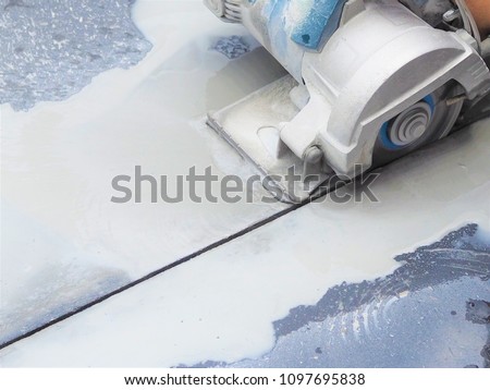 Close up wet sawing machine for cutting marble stone