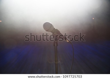 microphone against smoky disco background