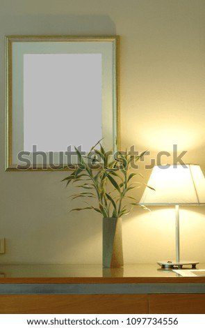 Living Room with picture frame and light lamp