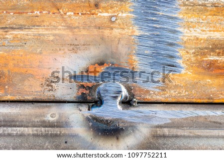 Welding on metal as a background