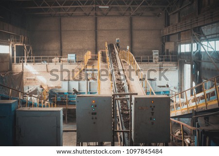Industrial interior of an old abandoned factory building
