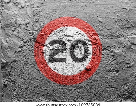 Speed limit sign painted on grunge wall