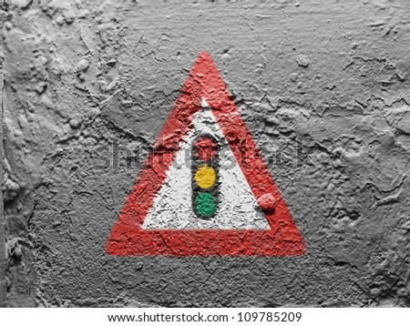 Light signals ahead  road sign painted on grunge wall