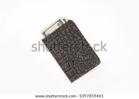 Wallet with money isolated on white background. Denominations of 100 dollars. Close-up photo