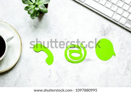 client support service workdesk with mail signs gray background 
