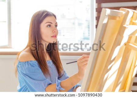 Creative woman working in art studio