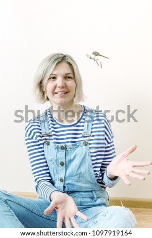 Photo of girl with key from apartment