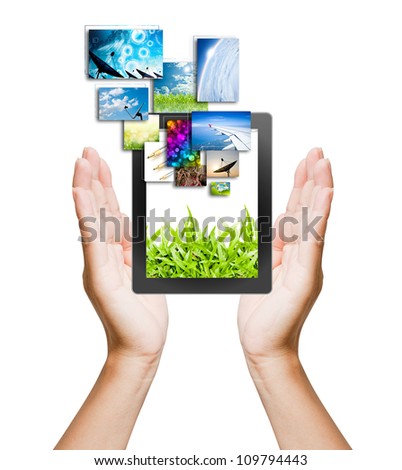 touch pad PC and streaming images buttons on women hand on background white