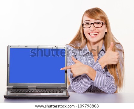Smiling Businesswoman showing laptop with copy-space isolated on white
