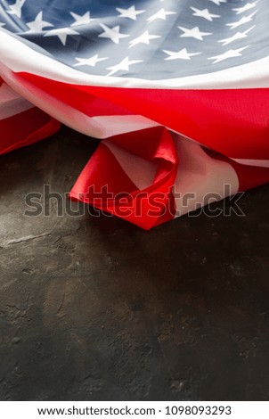 American flag on a stone background. Symbol of patriotism, freedom and independence
