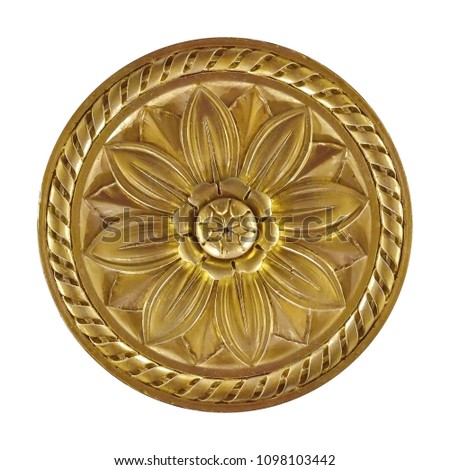 Golden decorative element in the form of a flower isolated on a white background