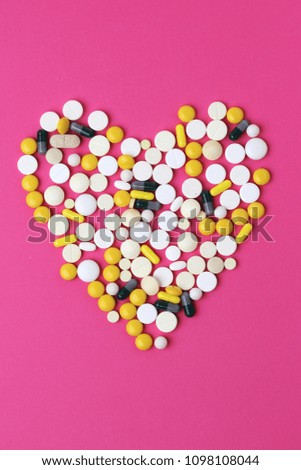 Medicine forming a sign of heart as a symbol of chemistry in love
