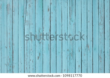 Light blue colored vertical wood planks background texture