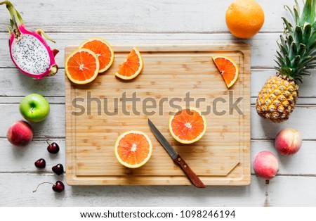 Assortment of tropical citrus fruits background