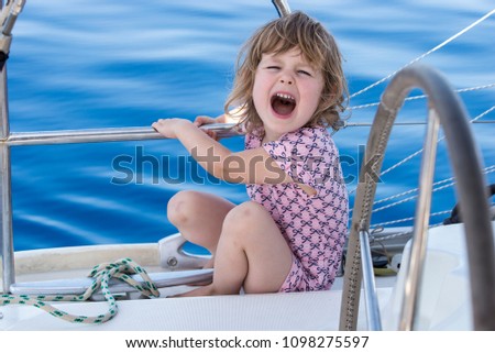 The girl on the sailing boat.